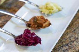 fermented foods on spoons